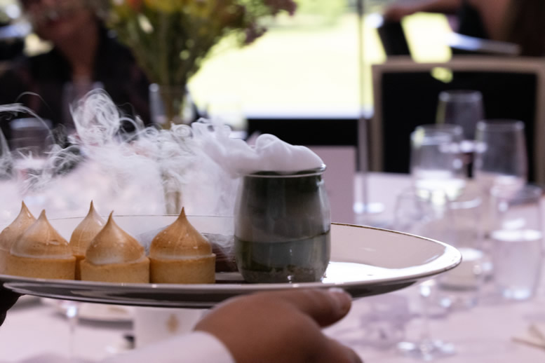 Waiter carrying a tray at the Melbourne Cup Luncheon