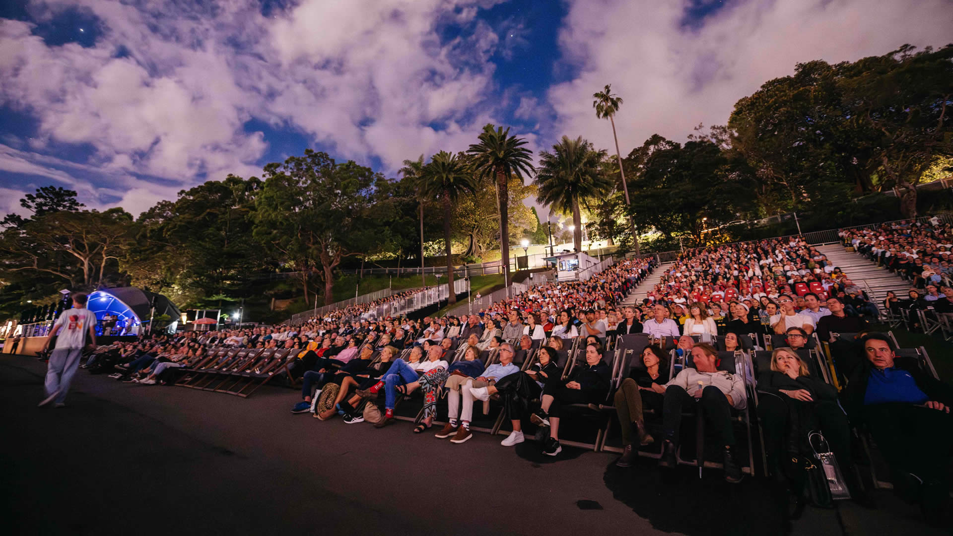 The audience arrives